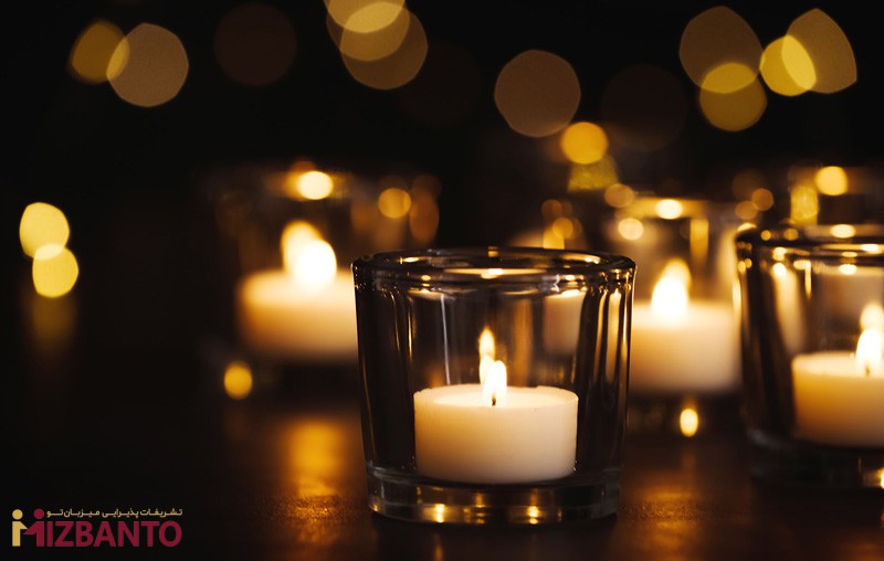 شمع روشن در ظرف